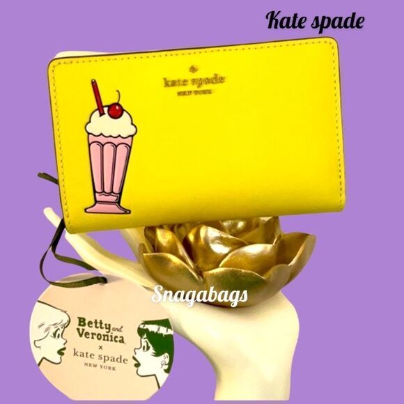 KATE SPADE NWT YELLOW LEATHER ARCHIE MEDIUM BIFOLD WALLET COMICS BETTY VERONICA - Picture 1 of 13